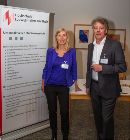 Prof. Dr. Raab und Kathrin Paul am Stand der Hochschule für Wirtschaft und Gesellschaft Ludwigshafen, Studiengang: „International Business Administration and Information Technology (IBAIT)“ (B. Sc.) Prof. Dr. Raab und Kathrin Paul am Stand der Hochschule für Wirtschaft und Gesellschaft Ludwigshafen, Studiengang: „International Business Administration and Information Technology (IBAIT)“ (B. Sc.)