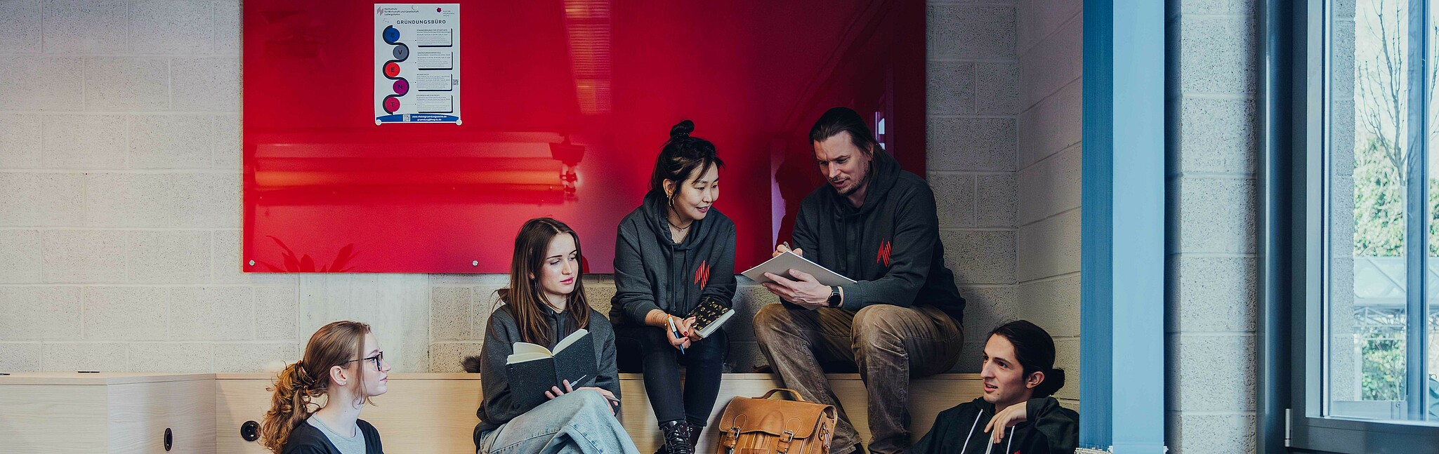 Students on a staircase in the creative space